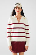 white sweater with dark red stripes and wide v neck