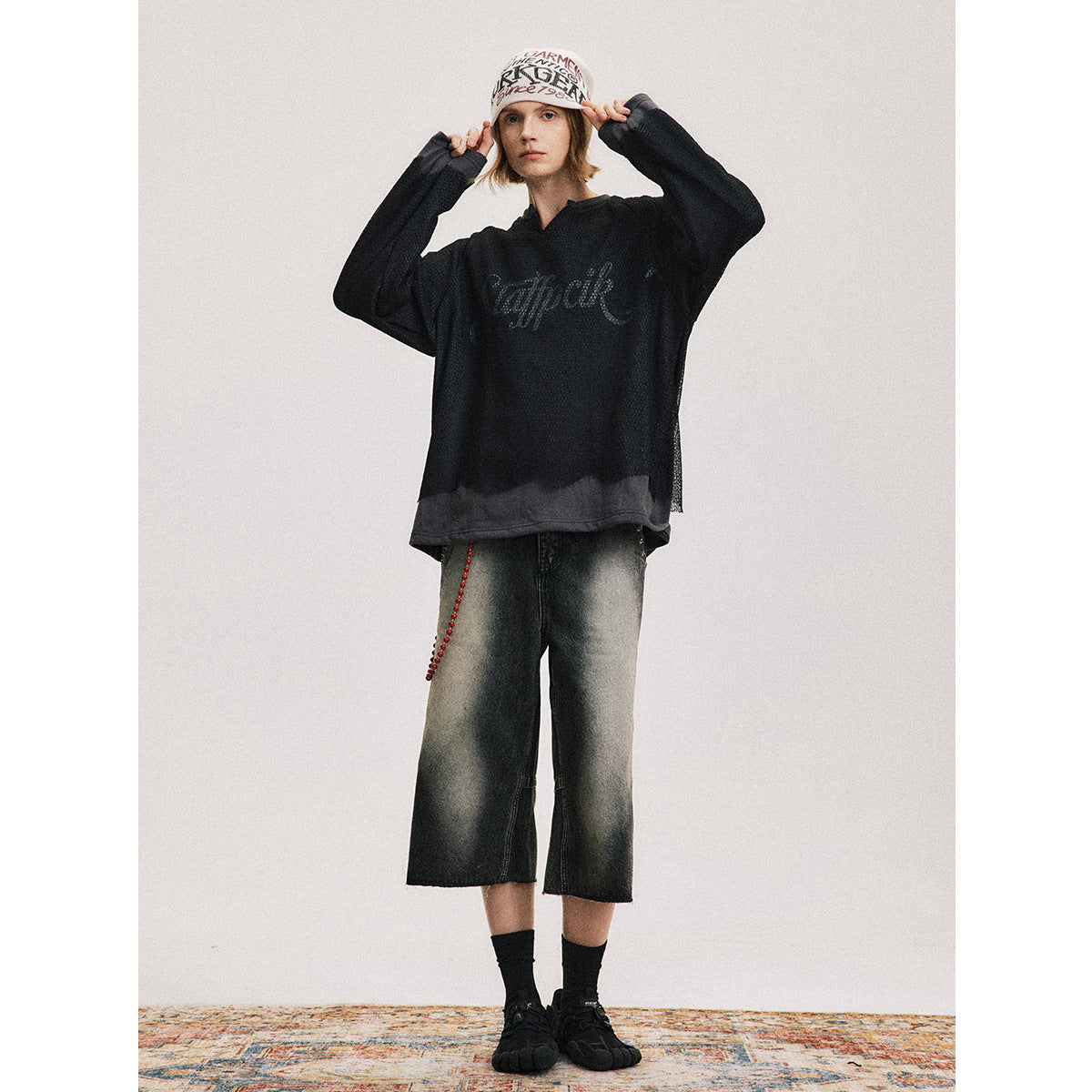 UNIKCOSA NoirFit Hollow Out Damaged Mesh Spliced Sweatshirt💫