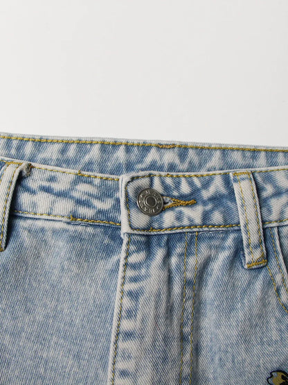 UNIKCOSA Women’s Vintage Washed Jeans – High-Waist Straight Denim with Hollow-Out Sun & Flower Print Design