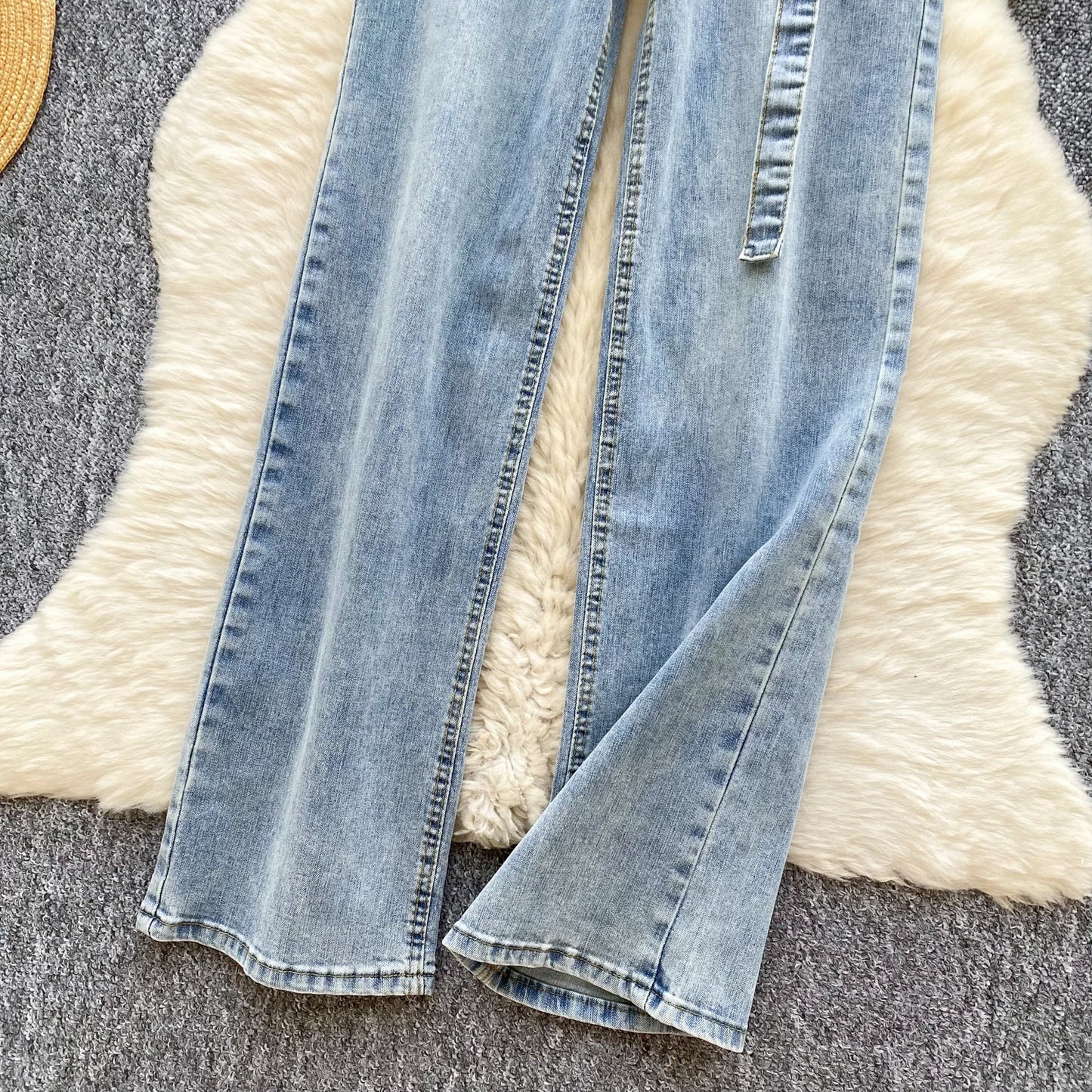 UNIKCOSA Women’s Spring Denim Jeans – 2025 High-Waist Printed Long Pants with Sash Belt (Outdoor Chic Edition)