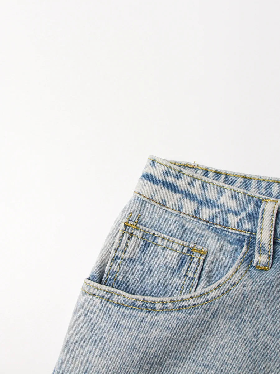 UNIKCOSA Women’s Vintage Washed Jeans – High-Waist Straight Denim with Hollow-Out Sun & Flower Print Design