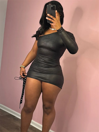 UNIKCOSA’s One-Shoulder Bandage Hollow Mini Dress — Irregular Diagonal Collar, Backless Bodycon Elegance