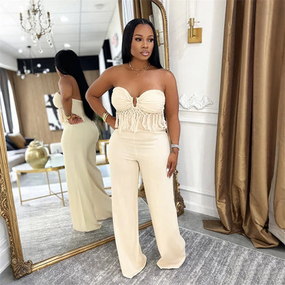 UNIKCOSA’s 2025 Summer Tassel Jumpsuit — Strapless Backless Bodycon One-Piece Nightclub Elegance