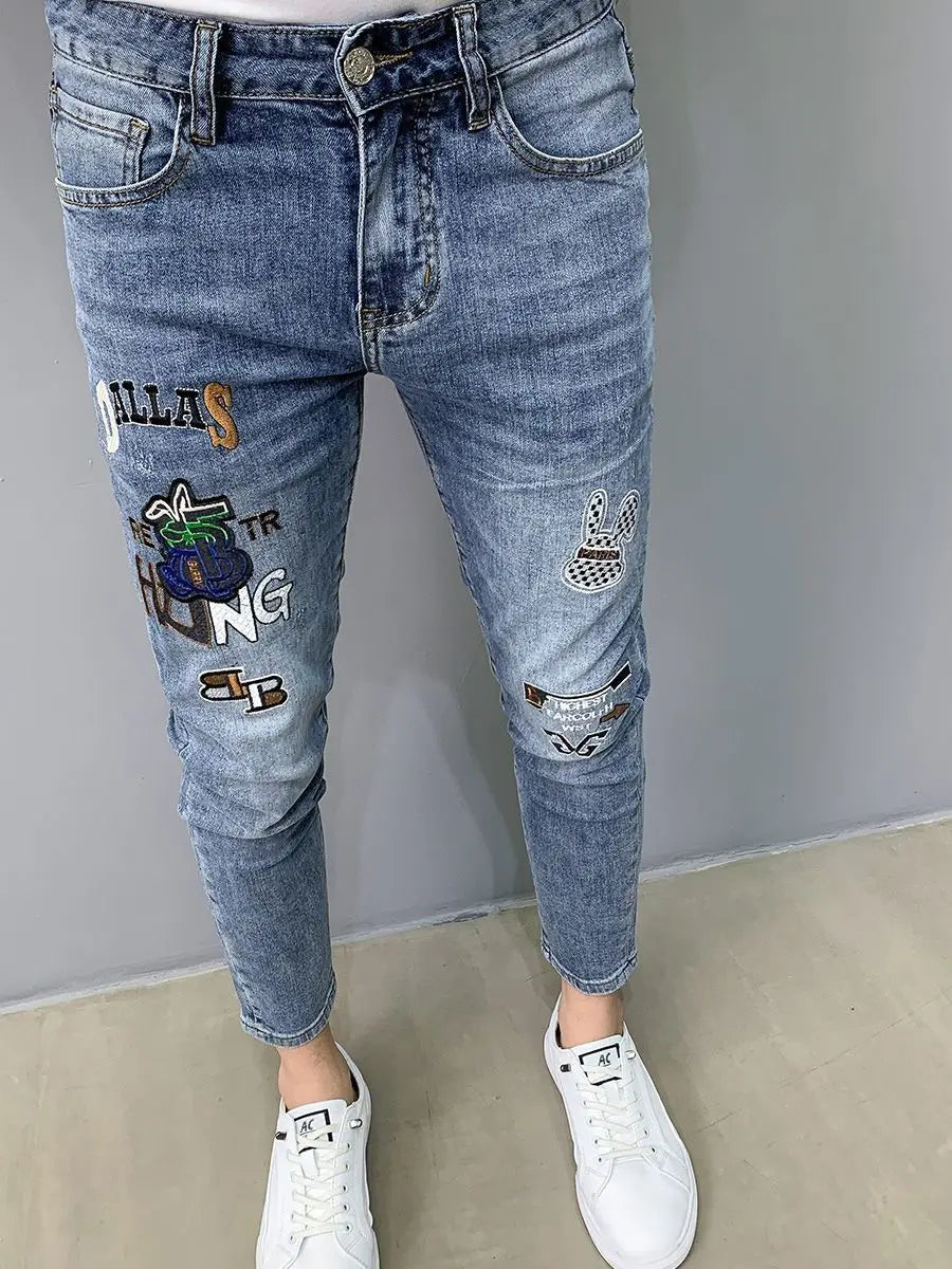 UNIKCOSA Men’s Slim Embroidered Jeans – Luxury Korean Fashion Pencil Pants (2024 Autumn/Summer Edition)