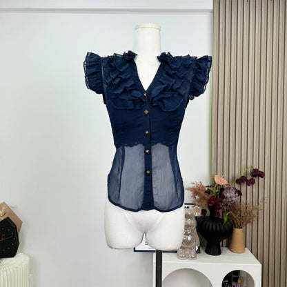 UNIKCOSA’s 2025 French Vintage Ruffle Blouse — Sleeveless V-Neck Coquette Chic