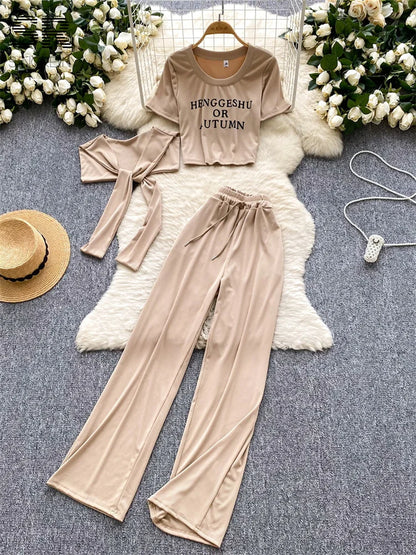 UNIKCOSA’s 3-Piece Streetwear Set — Letter Print Tee + Elastic Pants + Solid Shawl