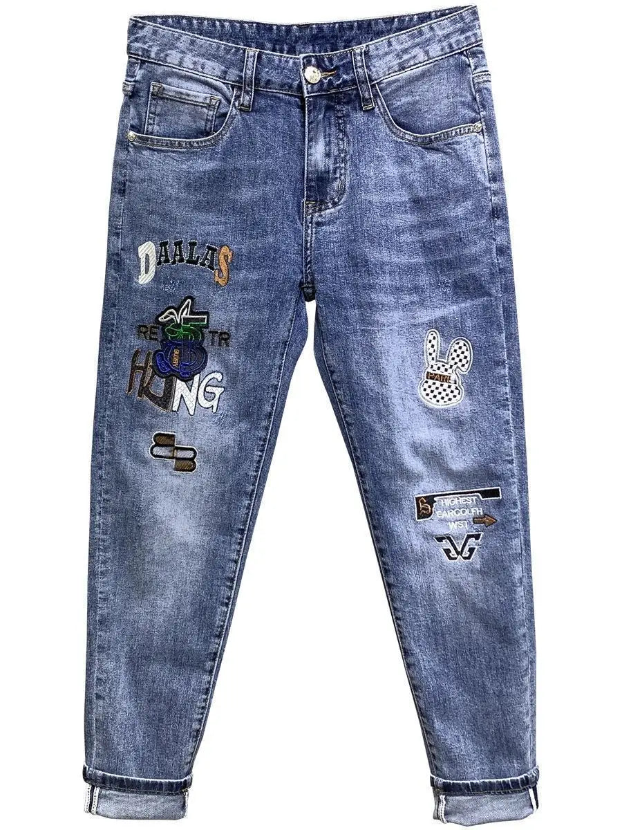 UNIKCOSA Men’s Slim Embroidered Jeans – Luxury Korean Fashion Pencil Pants (2024 Autumn/Summer Edition)