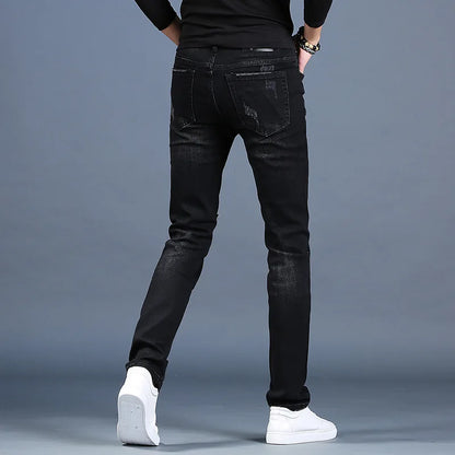 UNIKCOSA Men’s Ripped Embroidered Jeans – Slim Fit Black Patchwork Denim Casual Pants (Summer Thin Edition)