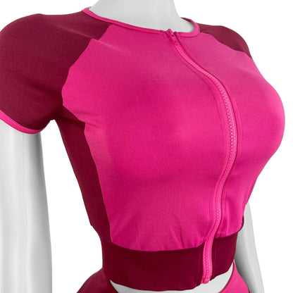 UNIKCOSA’s Color Block Streetwear Set — Short-Sleeve Zip Crop Top + High-Waist Pants