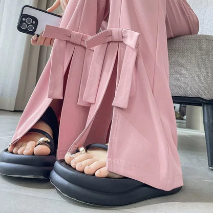 UNIKCOSA’s Bow-Slit Horseshoe Pants — High-Waist Slim Ice Silk Trousers