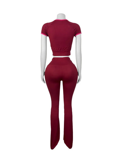 UNIKCOSA’s Color Block Streetwear Set — Short-Sleeve Zip Crop Top + High-Waist Pants