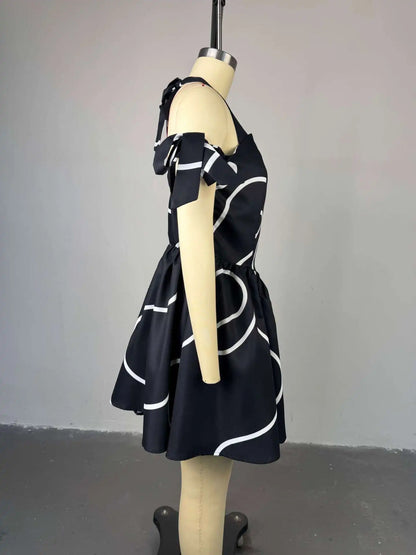 UNIKCOSA™ 2025 Summer Bowknot Halter Dress – Women’s Geometric Striped Swing Dress | Elegant Streetwear & Party Outfit