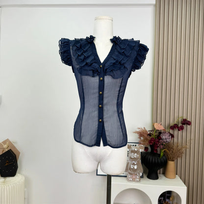 UNIKCOSA’s 2025 French Vintage Ruffle Blouse — Sleeveless V-Neck Coquette Chic
