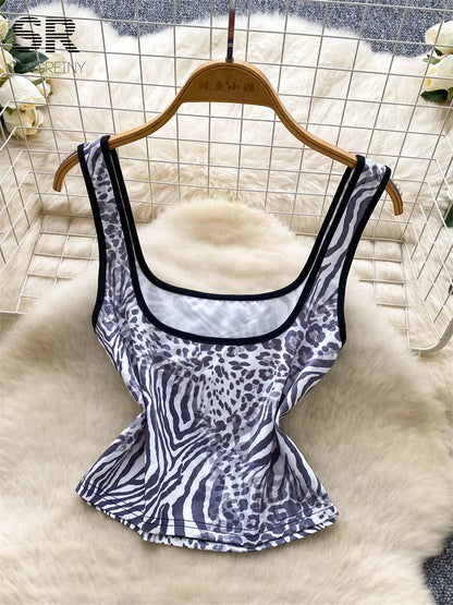 UNIKCOSA’s Summer Leopard 2-Piece Set — Sleeveless Crop Top + Flare Pants Streetwear