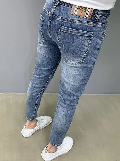 UNIKCOSA Men’s Slim Embroidered Jeans – Luxury Korean Fashion Pencil Pants (2024 Autumn/Summer Edition)