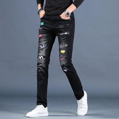 UNIKCOSA Men’s Ripped Embroidered Jeans – Slim Fit Black Patchwork Denim Casual Pants (Summer Thin Edition)
