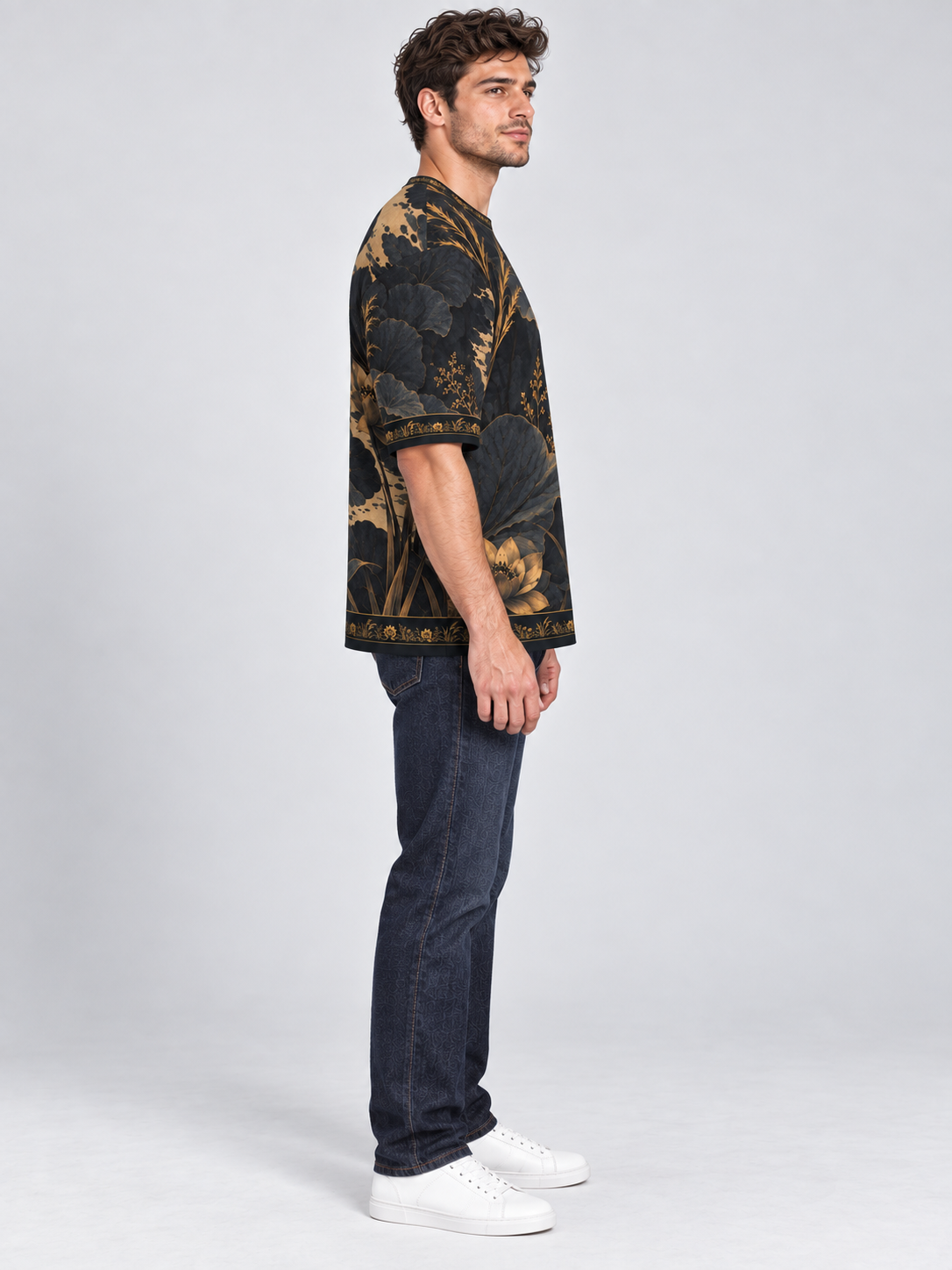 Midnight Lotus oversized cotton T-shirt side with indigo denim — AI-generated model styling illustration