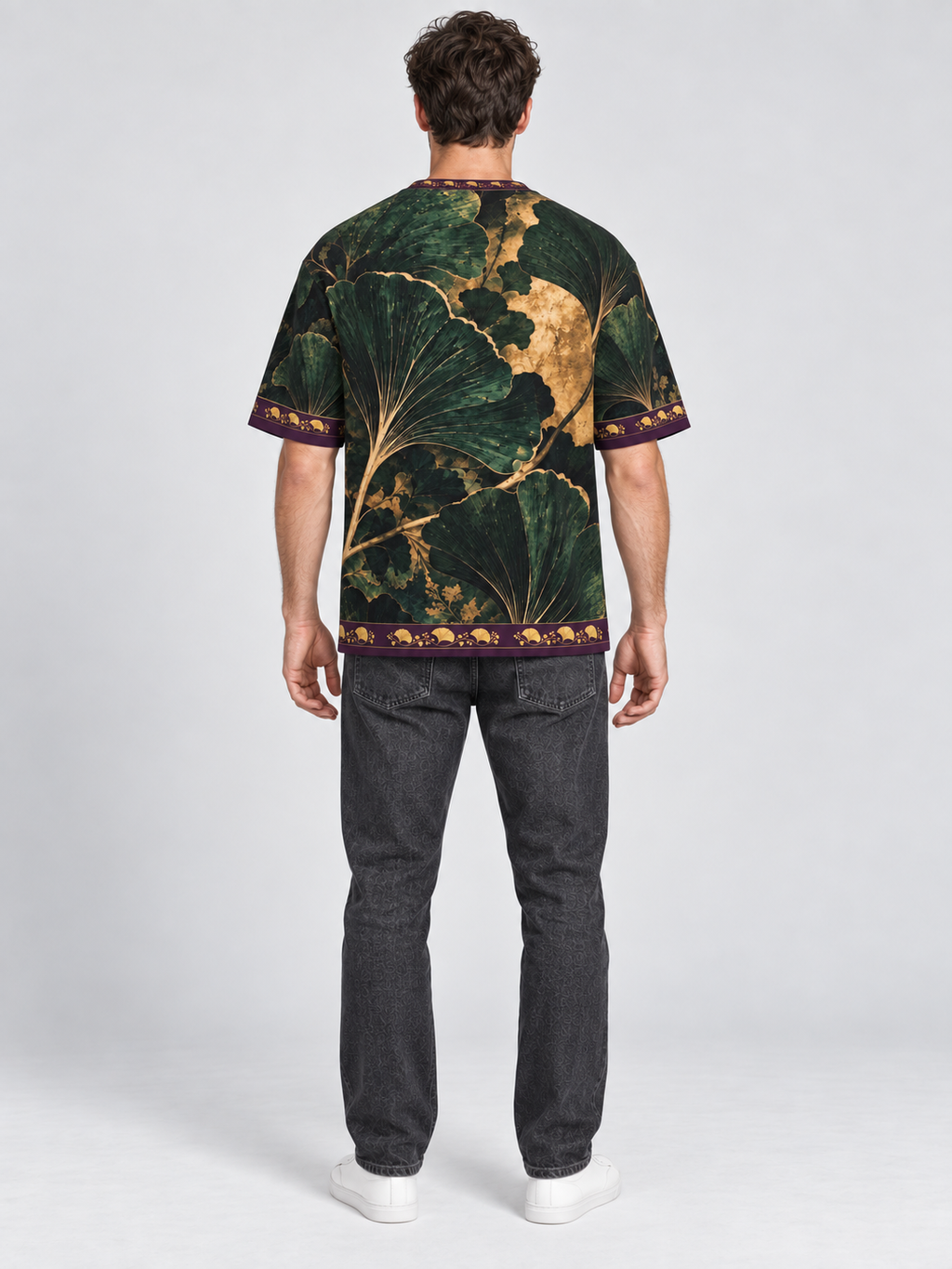 Verdant Ginkgo oversized cotton T-shirt back on adult model with washed-black denim — AI-generated styling illustration