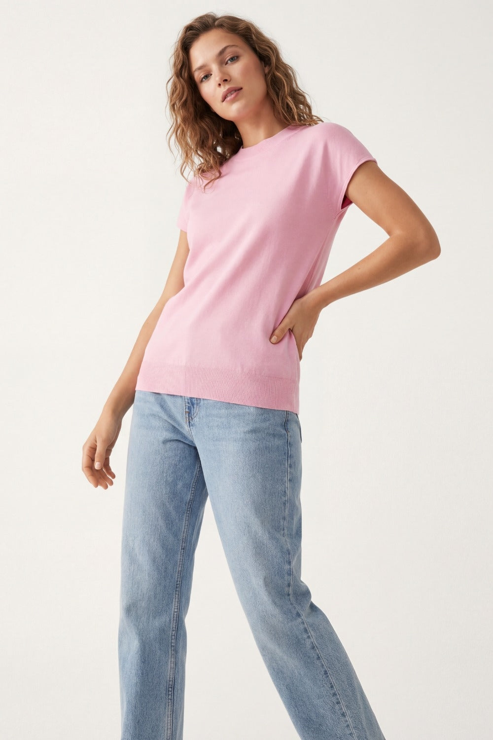 Baby pink turtleneck sweater with fitted short sleeves