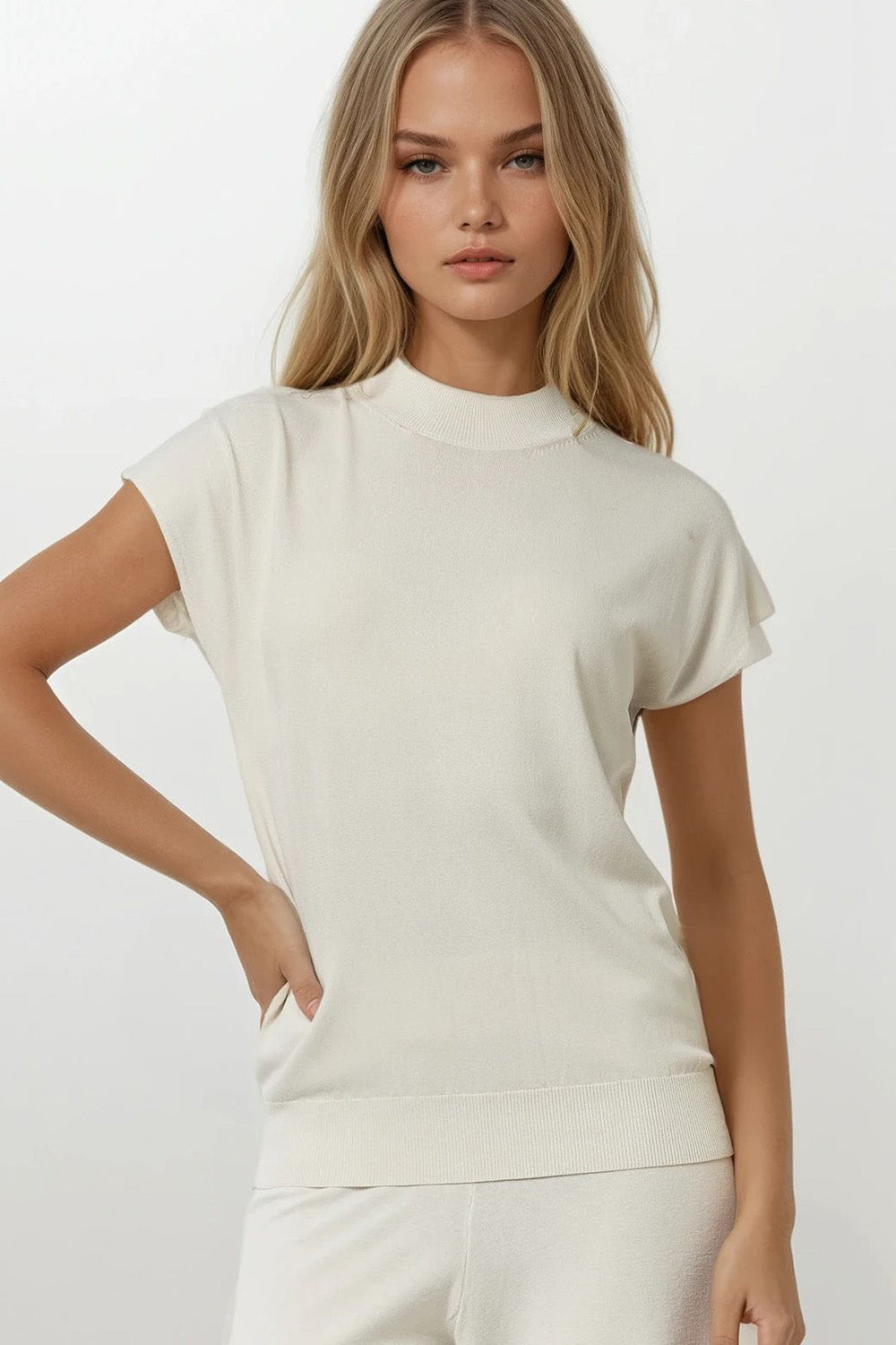 Beige turtleneck sweater with fitted short sleeves