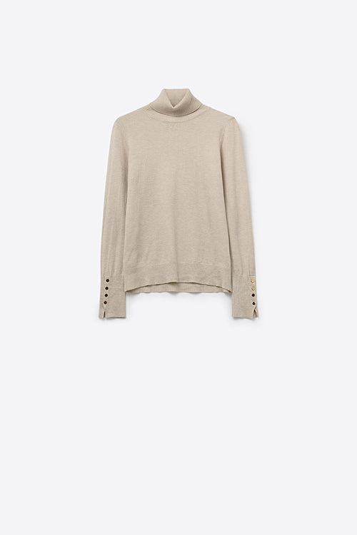 Q2 beige turtleneck sweater with gold buttons on the cuff