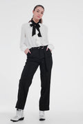 UNIKCOSA Black pants with wide legs and low hem