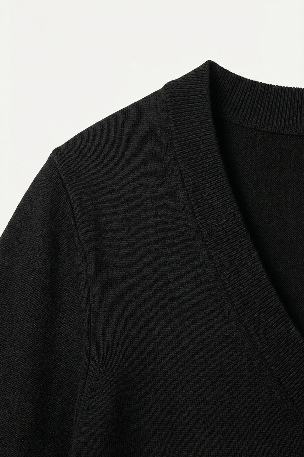 Black short-sleeve knit top with V-neck
