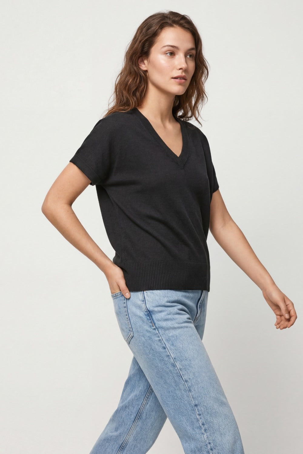 Black short-sleeve knit top with V-neck