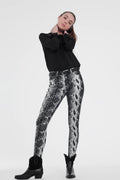 UNIKCOSA Black skinny shiny printed pants