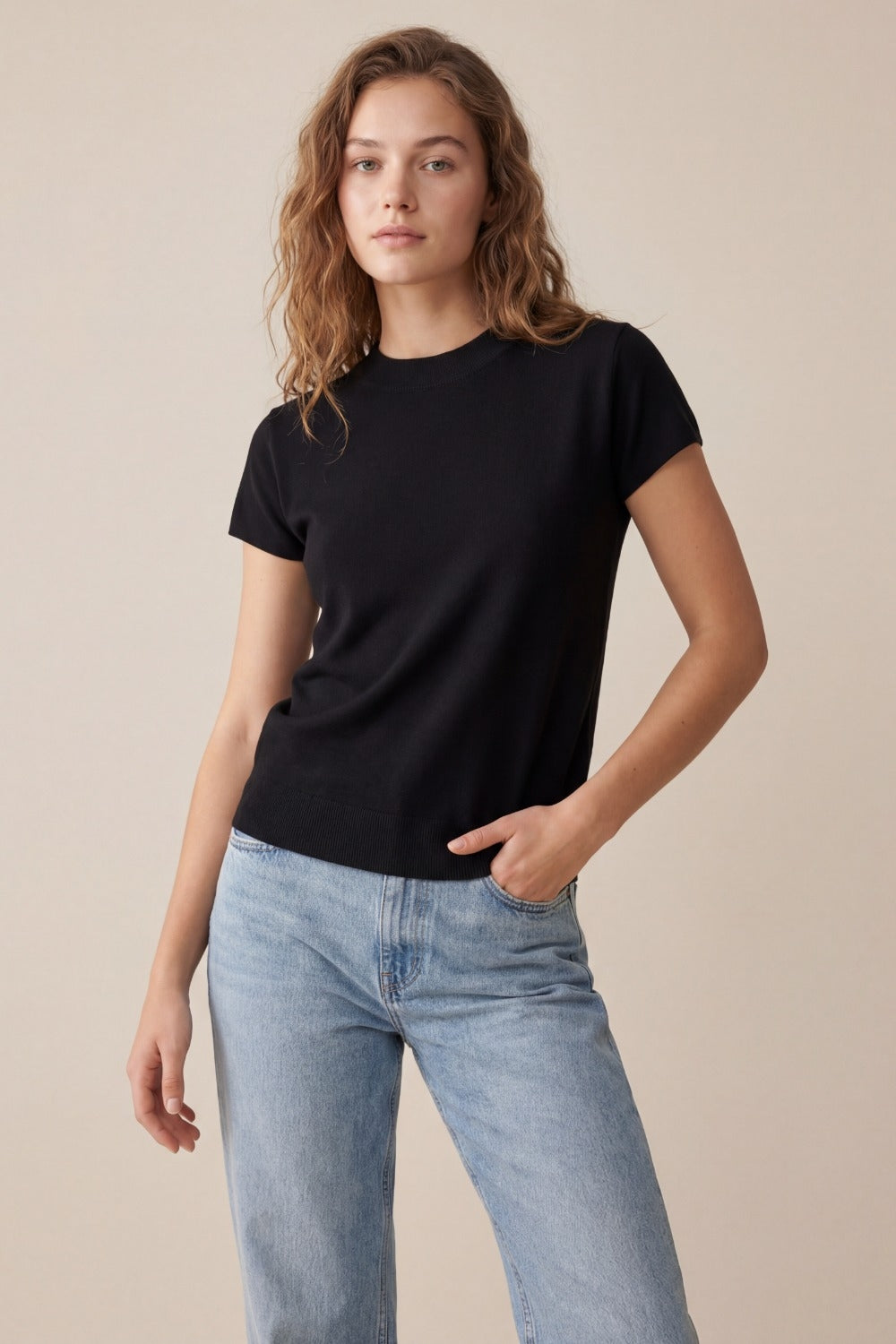 Black turtleneck sweater with fitted short sleeves