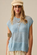 Blue sweater with soft open knit and dropped sleeves