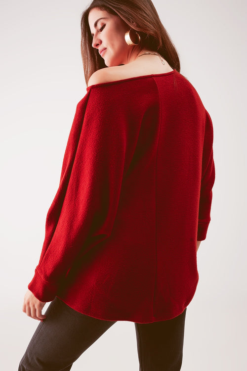 Boat neck batwing sweater in red orange