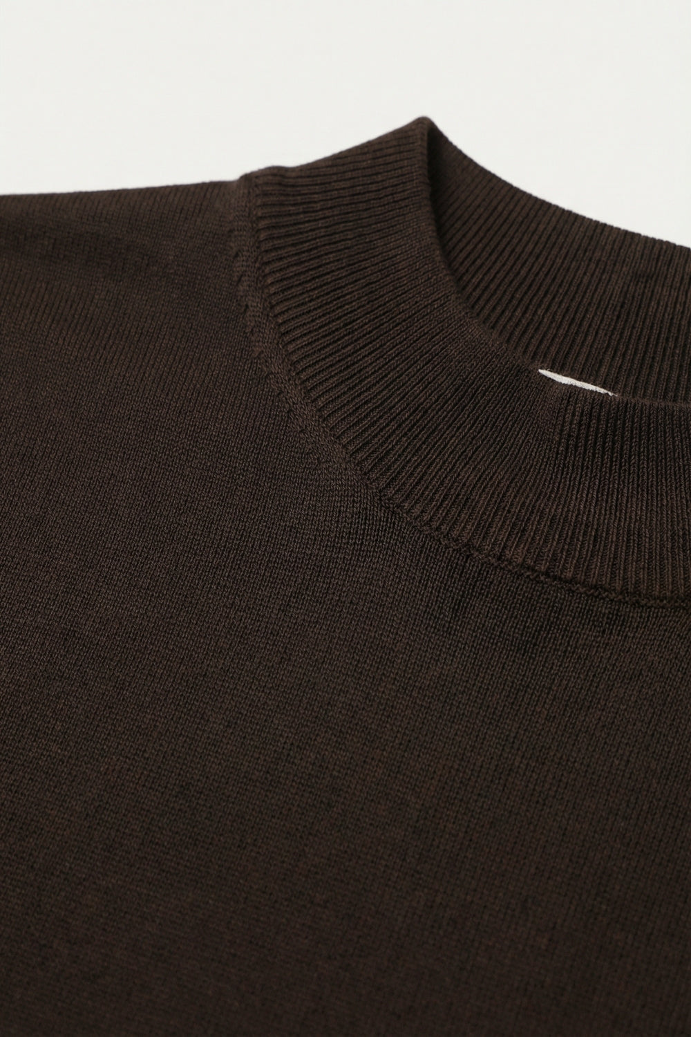 Brown turtleneck sweater with fitted short sleeves