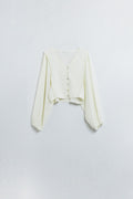Q2 Cream blouse with balloon sleeves and frontal closure with buttons