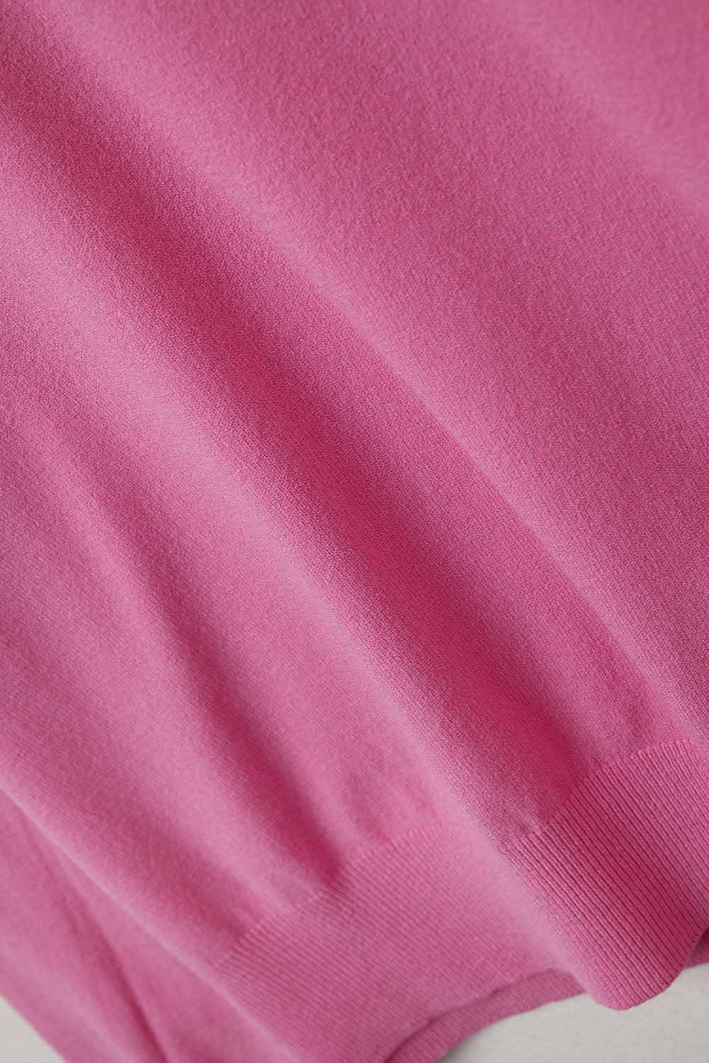 Fine Knit V-Neck Sweater with Decorative Neckline Detail in fuschia color
