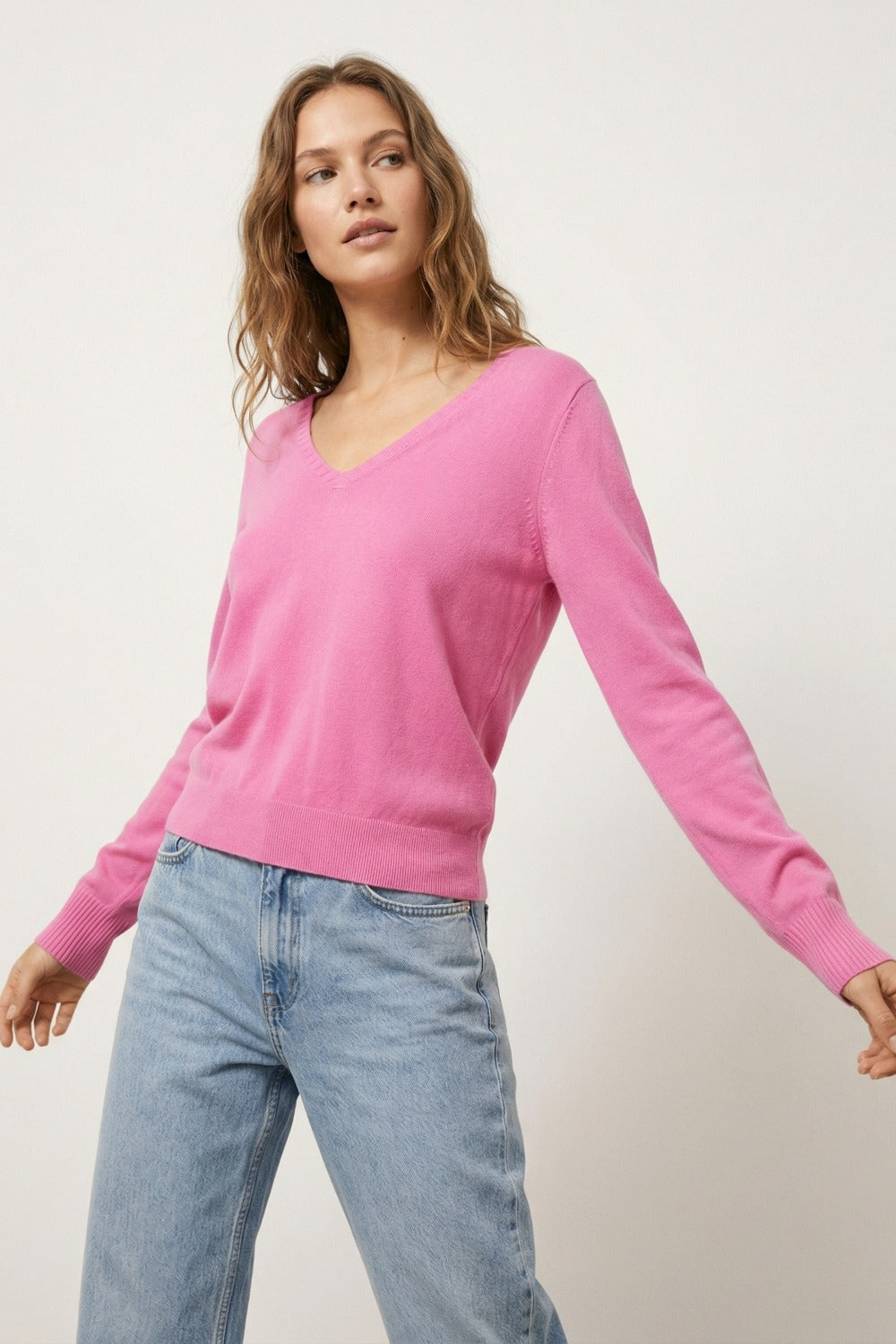 Fine Knit V-Neck Sweater with Decorative Neckline Detail in fuschia color
