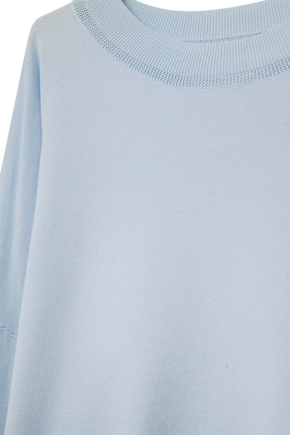 light blue knit sweater with mesh collar detail
