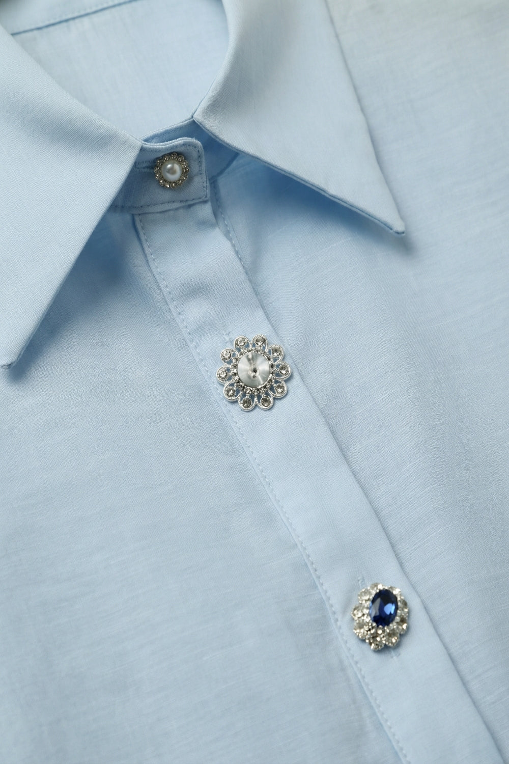 Light Blue Satin Button-Up Long Sleeve Shirt with two buttons on the cuff