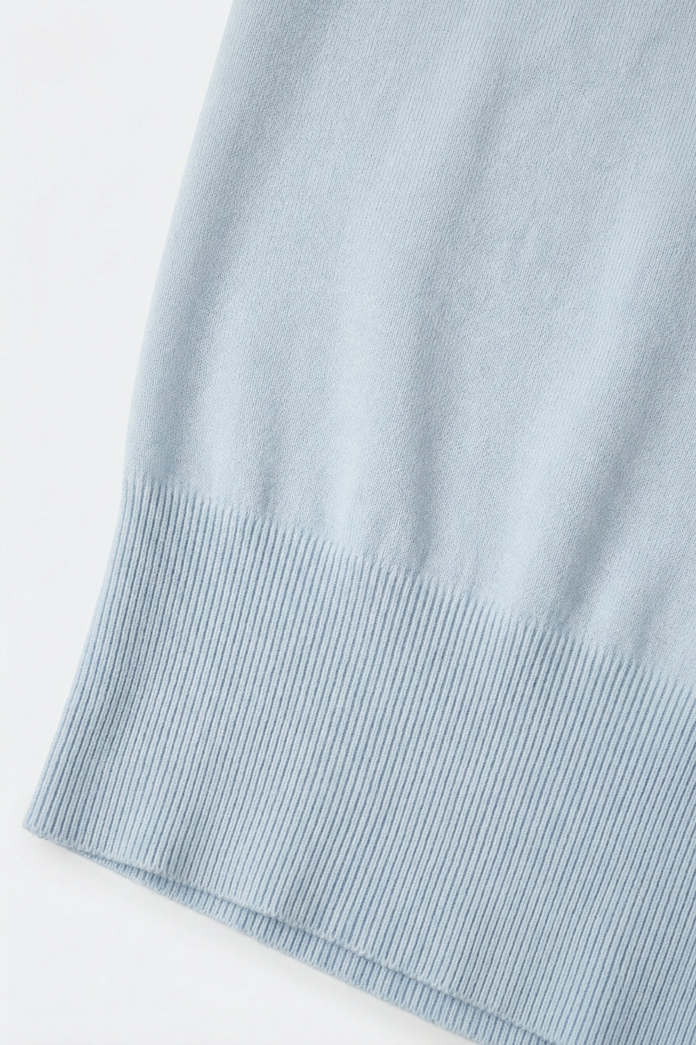 Lightweight Knit sweater with Wide Ribbed Waistband in light blue