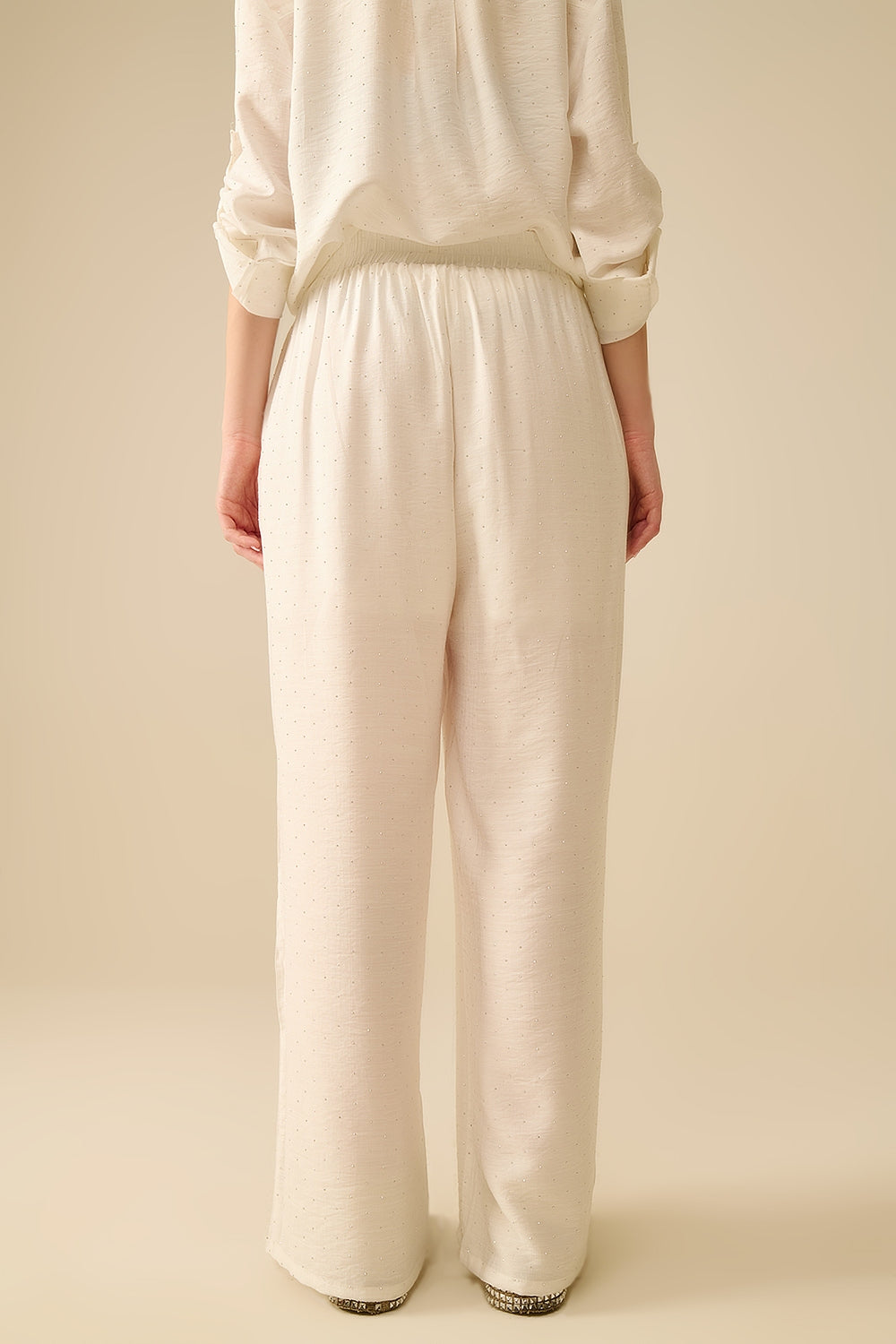 Lightweight wide-legged white pants with strass details