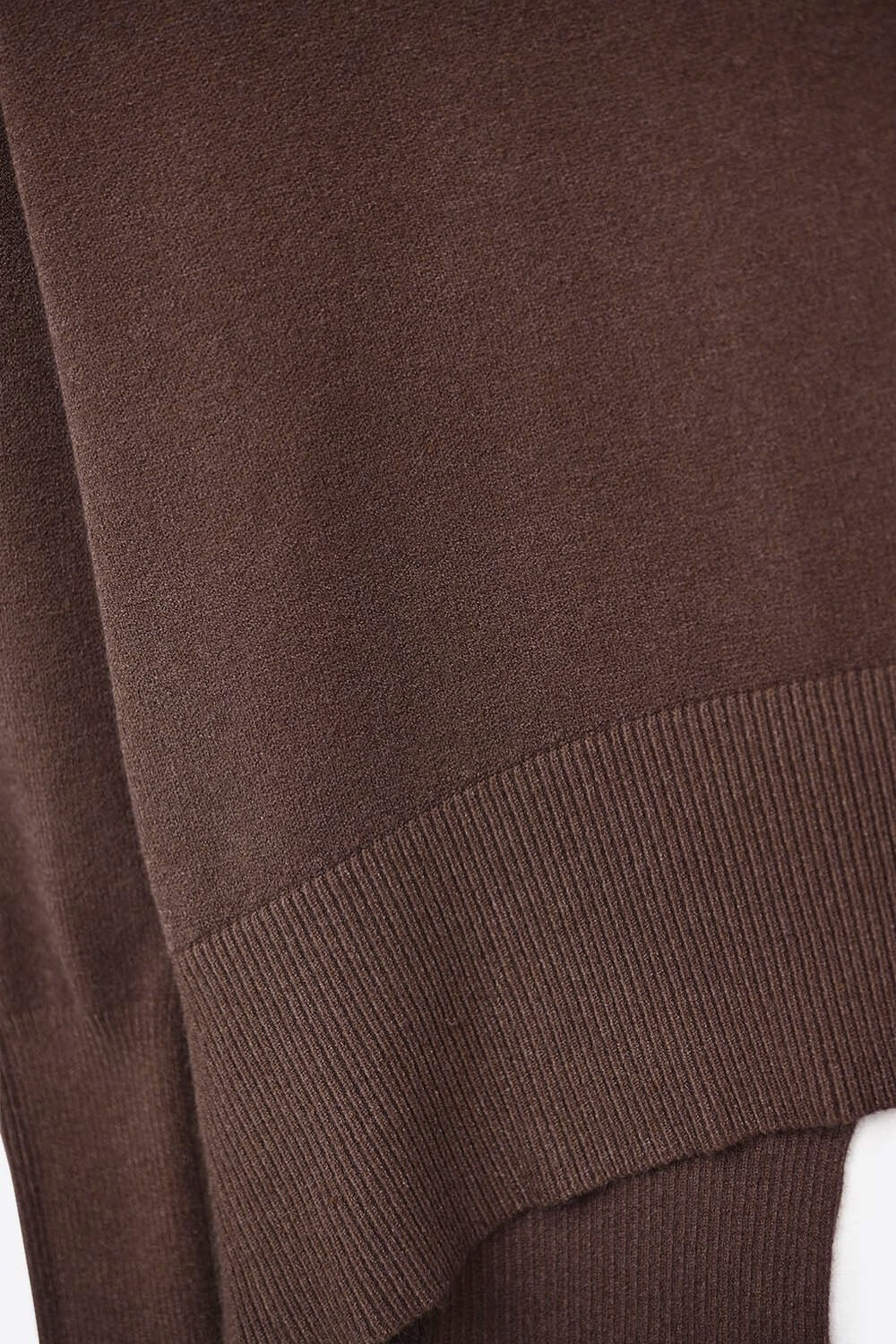 Loose brown sweater with open back detail