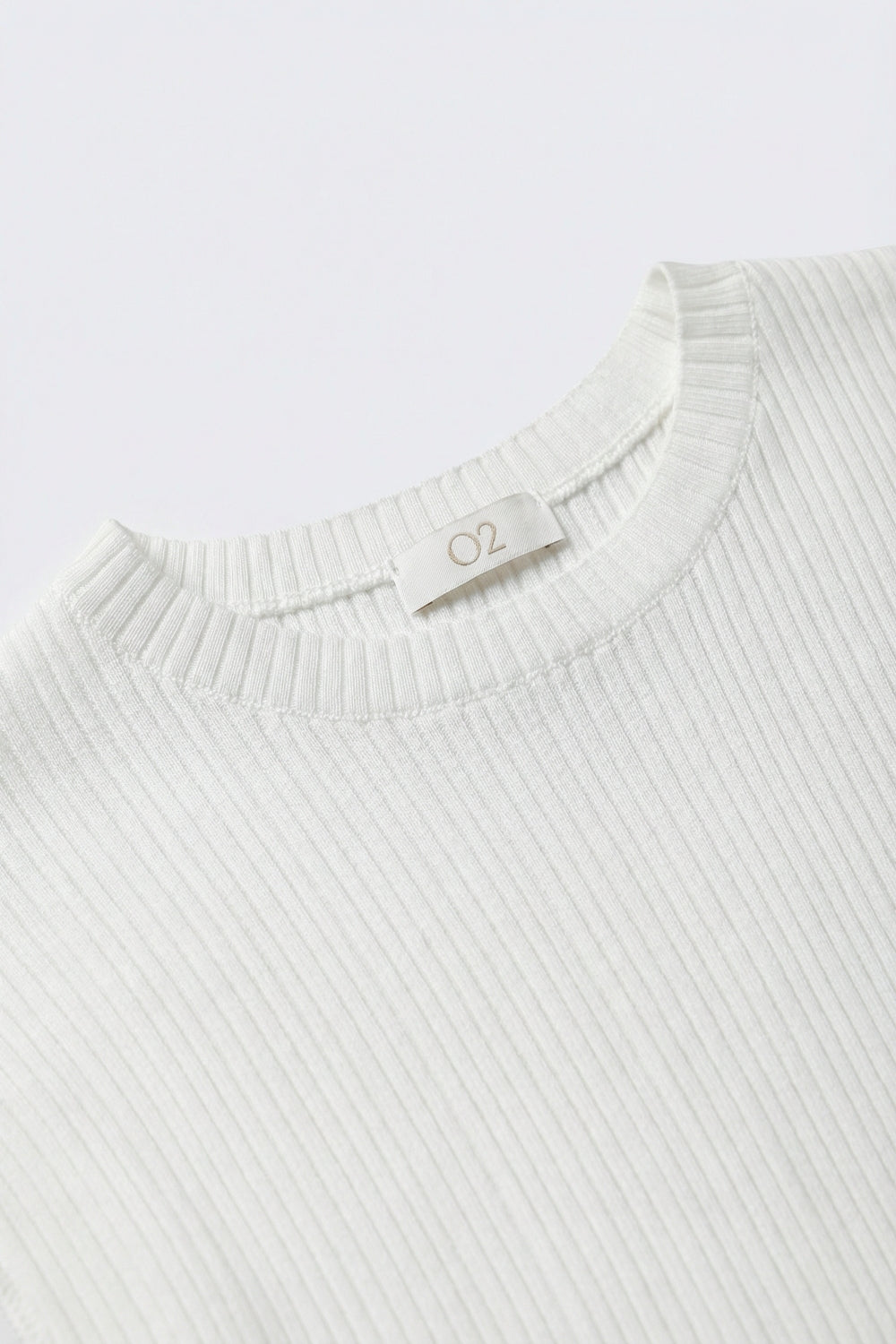 Ribbed Knit Slim Fit Sleeveless sweater in white
