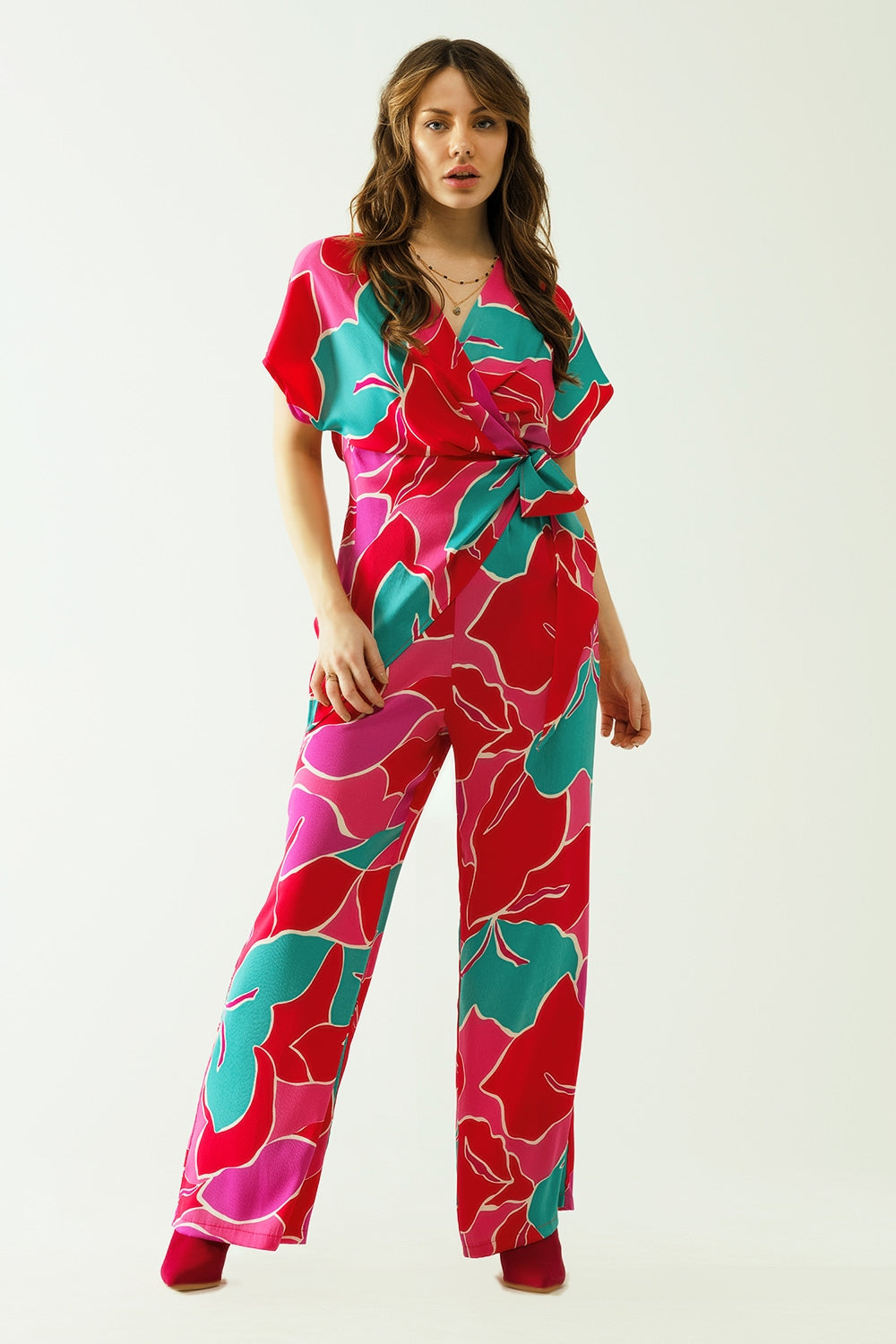 Satin Short sleeves top with floral design and a knot detail