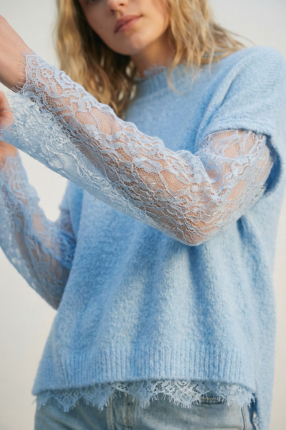 Soft Knit Sleeveless sweater with lace lining in blue color