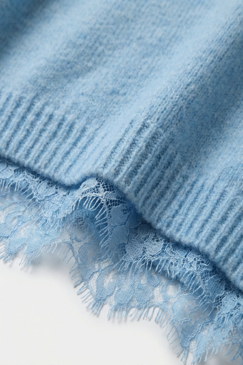 Soft Knit Sleeveless sweater with lace lining in blue color