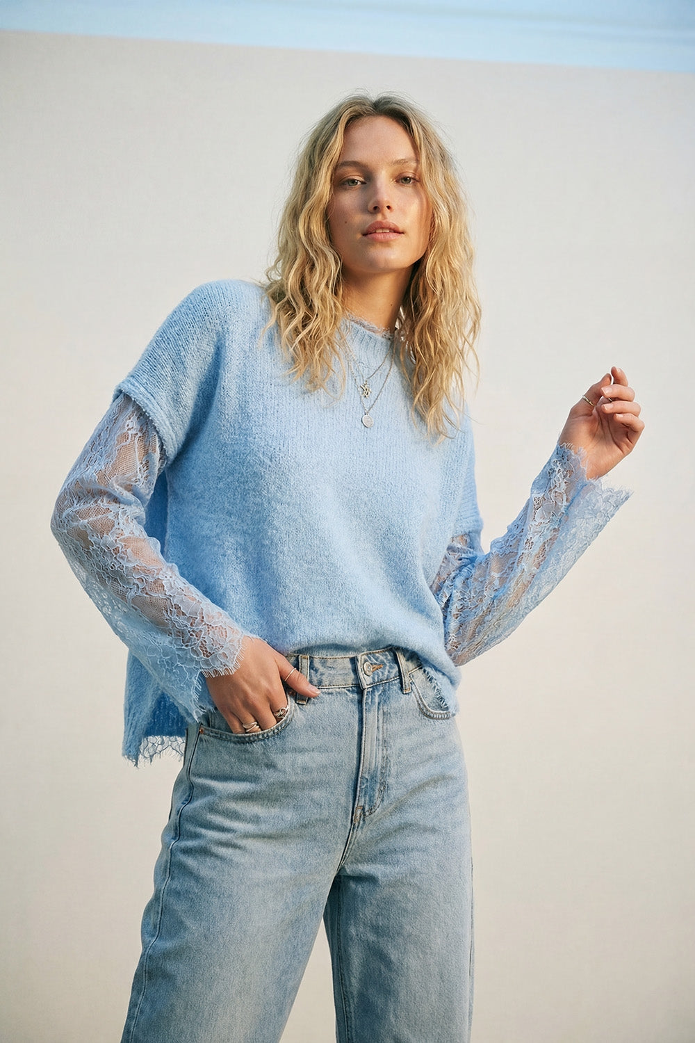 Soft Knit Sleeveless sweater with lace lining in blue color