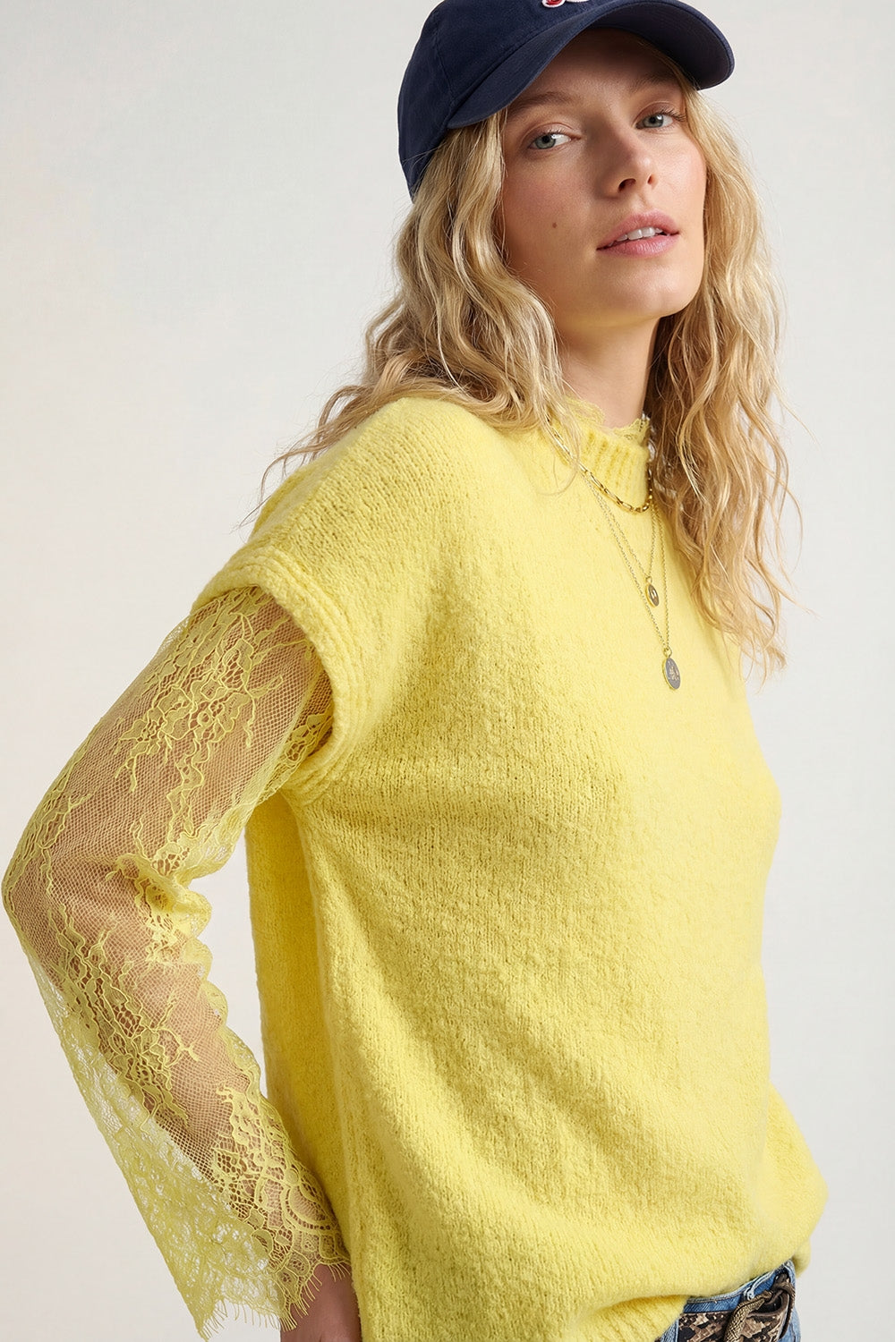 Q2 Soft Knit Sleeveless sweater with lace lining in yellow color