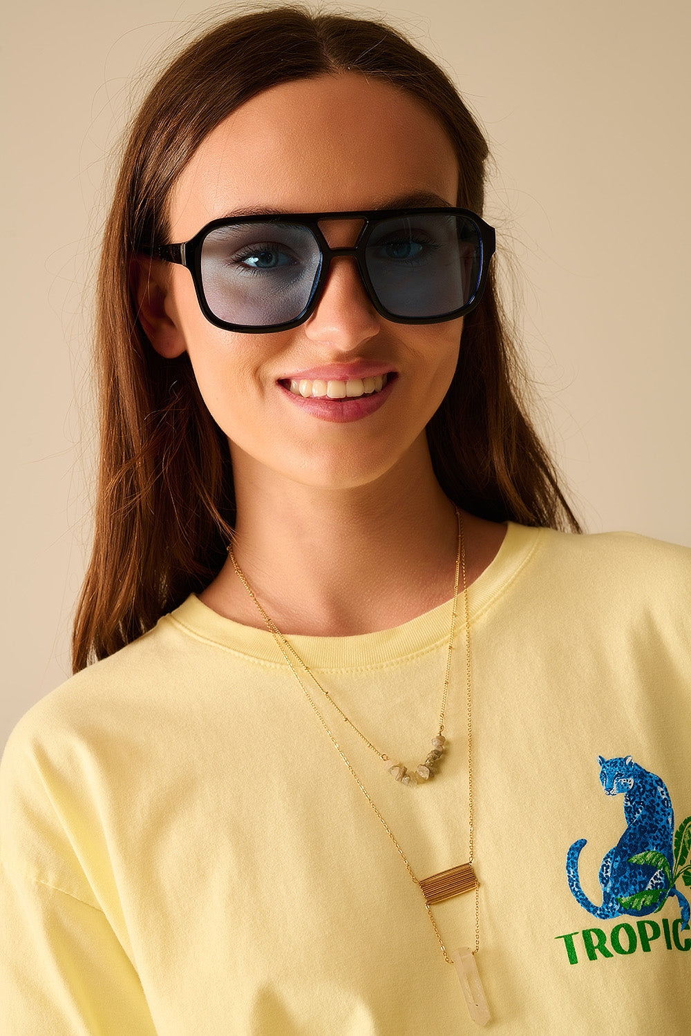 Q2 Sunglasses with black frames and blue lenses