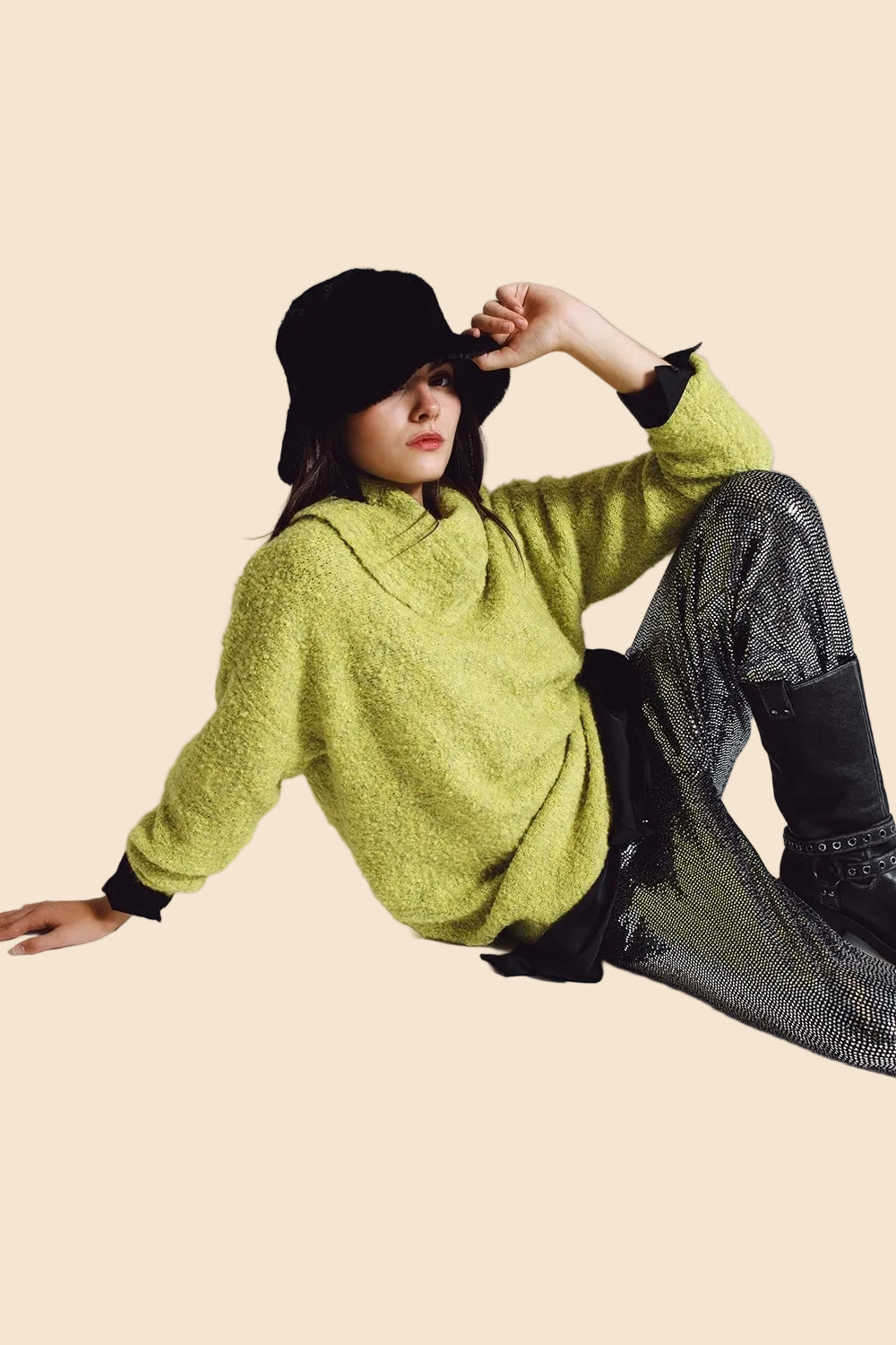 Q2 Sweater in green with a bardot neck.