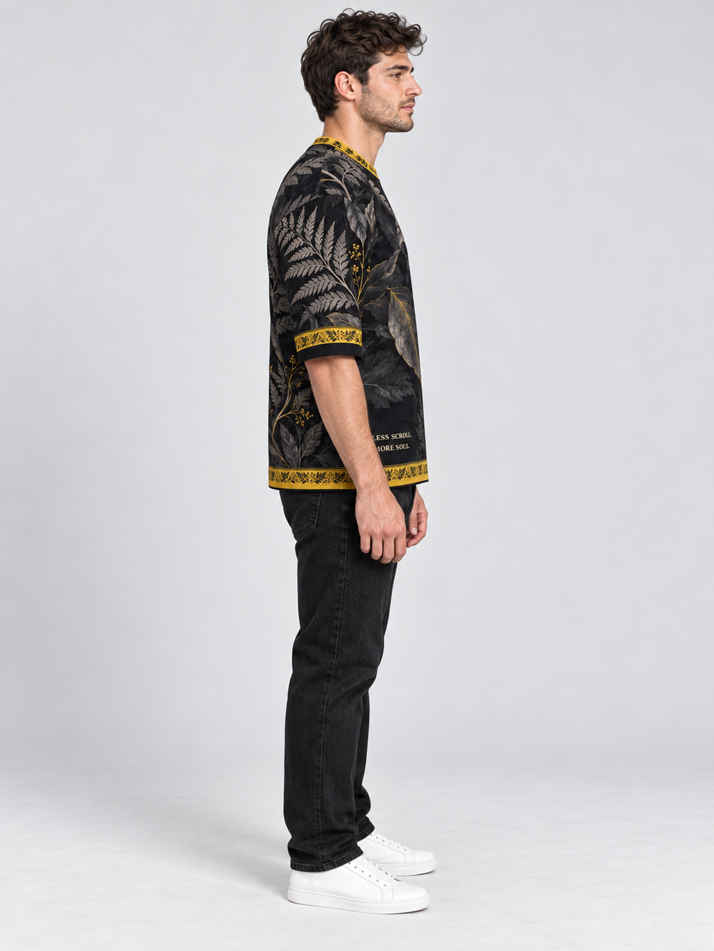 Graphite Fern Soul oversized cotton T-shirt — side on-model digital styling illustration with denim